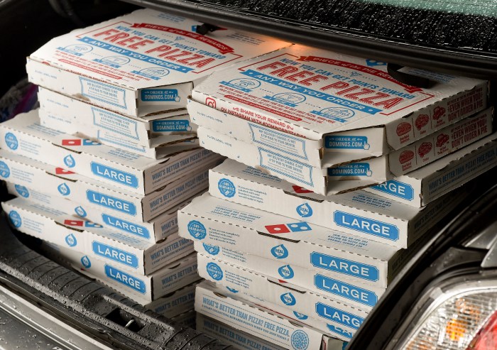 How did domino's develop its reputation in the pizza market